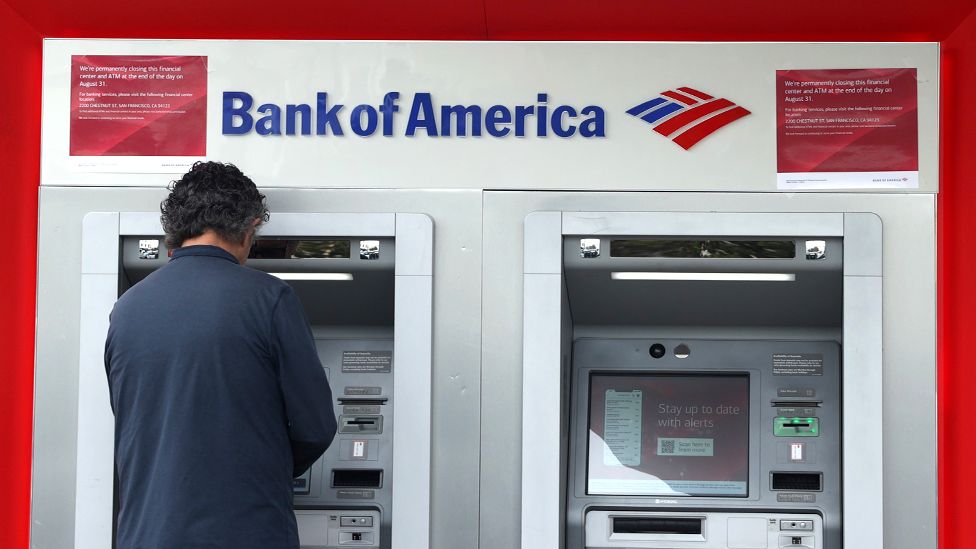 Customer at Bank of America ATM