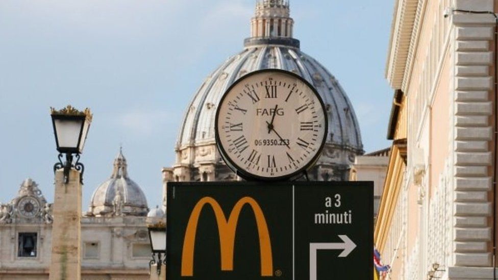 A McDonald's fast food restaurant, newly opened near the Vatican, divides opinion.