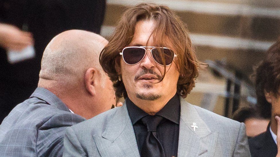 Johnny Depp seeks delay to US defamation trial due to Fantastic Beasts 3  filming - BBC News
