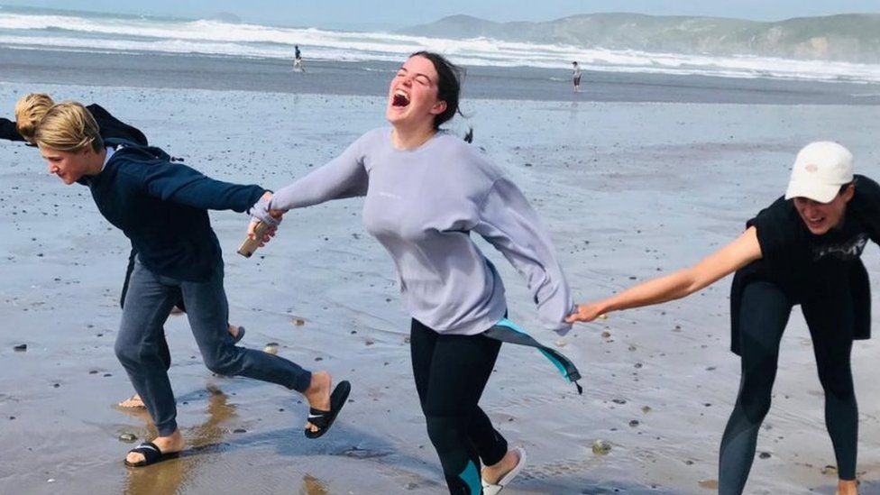 Maddy Lawrence and friends on the beach