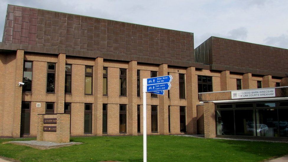 The former police office officer served as a magistrate for 18 years, including at Wrexham Magistrates' Court