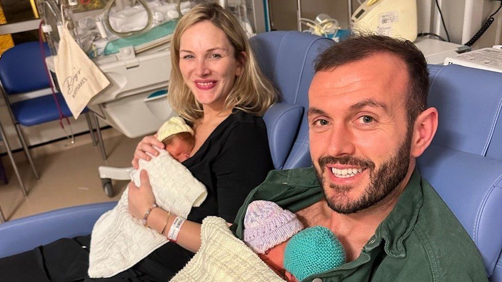Chris Wise and Hannah Gurney with their babies in hospital