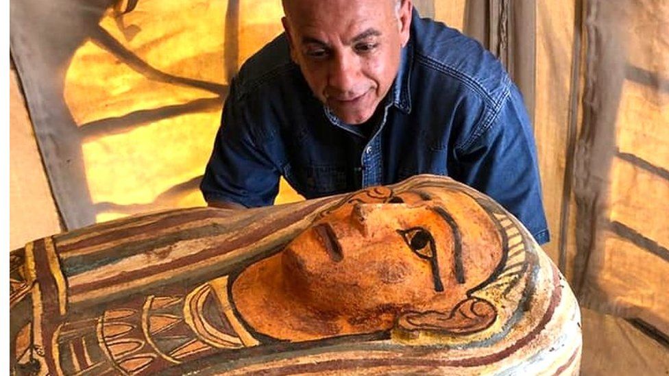 A wooden sarcophagus discovered down an ancient well in Saqqara, Egypt