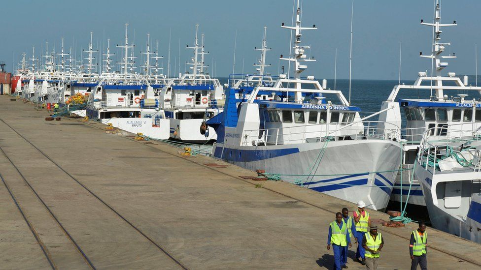 Security guards patrol past the EMATUM fishing fleet docked in Maputo, Mozambique, May 3, 2016.