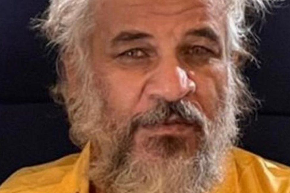 Handout photo from Iraq's Security Media Cell showing Sami Jasim al-Jaburi after his capture (11 October 2021)