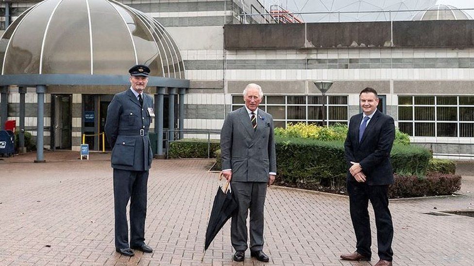 Prince Charles alongside Sqn Ldr Geoff Dickson (left) and director general of technology at GCHQ Gav Smith