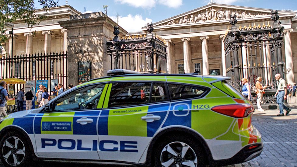 A police car patrols around the British Museum in London, Britain
