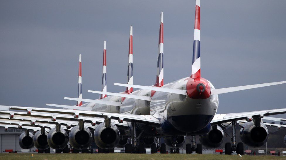 oronavirus outbreak 2020: British Airways passenger planes are seen parked up on a runway at Glasgow Airport on March 25th 2020