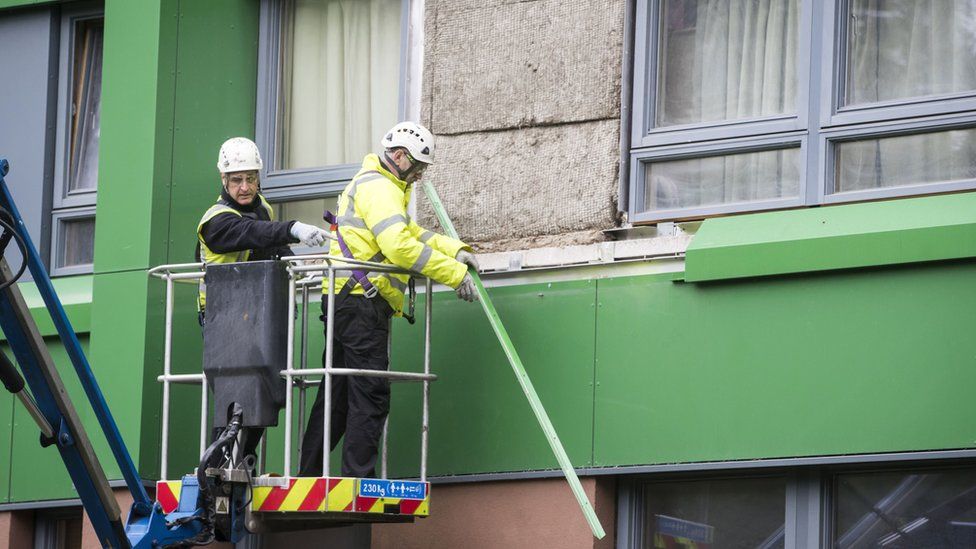Cladding being removed from a tower block in Sheffield
