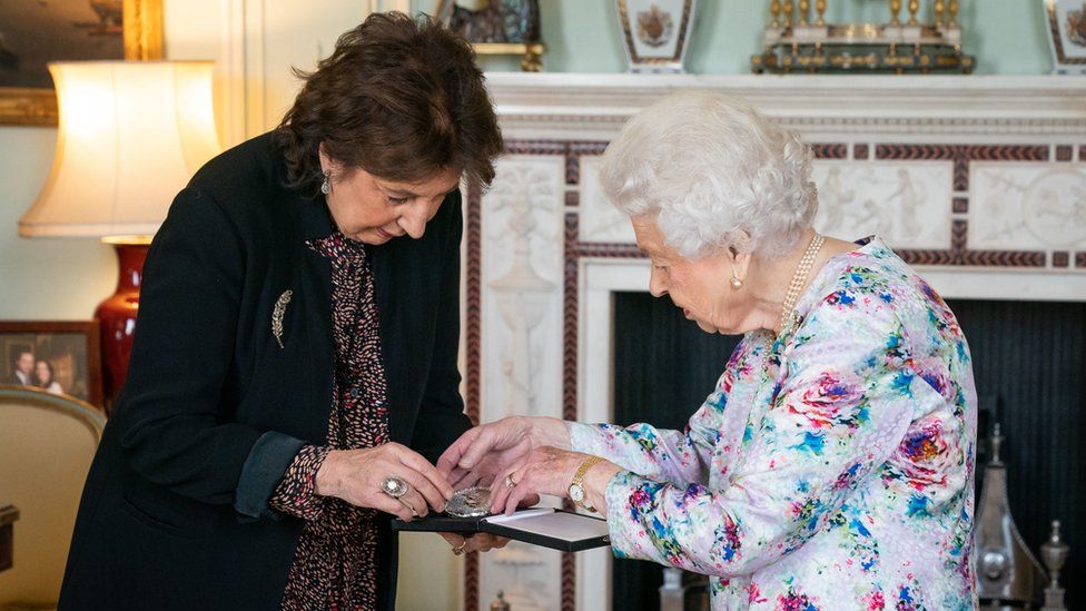 Dame Imogen Cooper is received by Queen Elizabeth II at Buckingham Palace where she was presented with The Queen's Medal for Music for 2019 on October 13, 2021