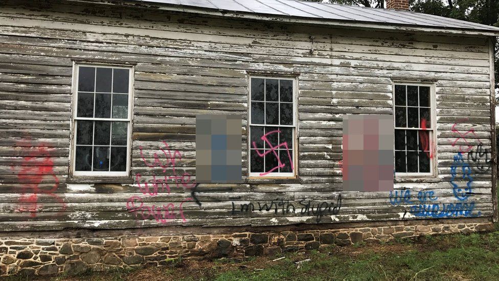 Swastikas were also painted across the windows, with another "white power" message