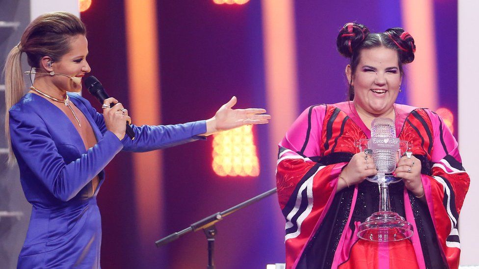 Netta accepting the trophy for the Eurovision Song Contest 2018