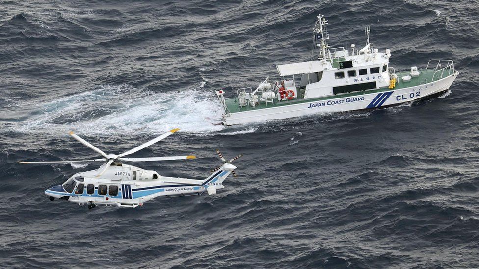 Helicopter and boat