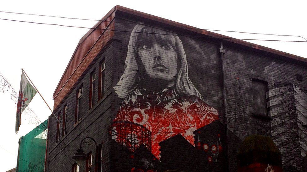 Artwork featuring musician Gwenno, outside Clwb Ifor Bach in Cardiff