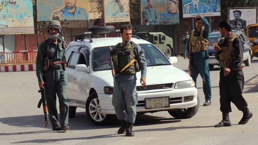 Afghan policemen keep watch in central Kunduz, Afghanistan October 3, 2016.