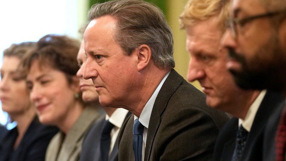 The new British Foreign Secretary David Cameron, attends a Cabinet meeting inside 10 Downing Street in London