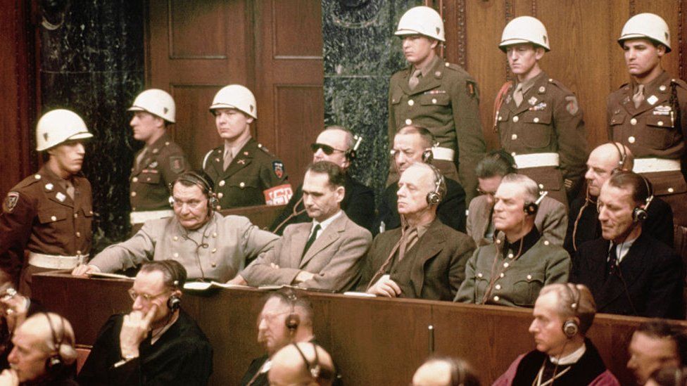 The defendants at the Nuremberg Nazi trials. Pictured in the front row are: Hermann Goering, Rudolf Hess, Joachim Von Ribbentrop, Wilhelm Keitel and Ernst Kaltenbrunner. In the back row are: Karl Doenitz, Erich Raeder, Baldur von Schirach, and Fritz Sauckel.