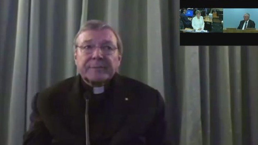 Screen grab shows Australian investigators (top right) questioning Rome-based Cardinal George Pell via video link