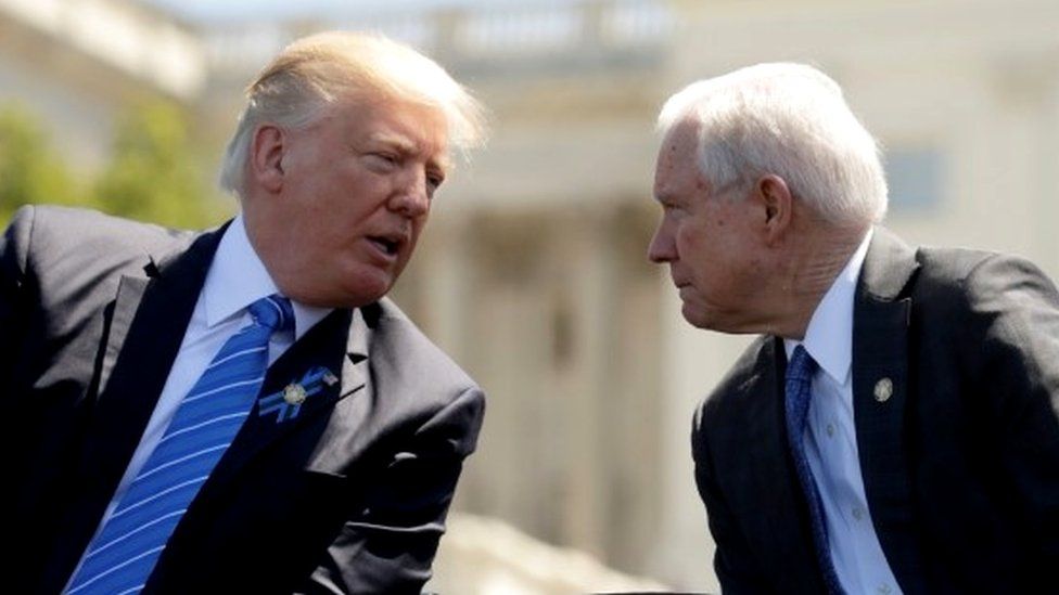 President Donald Trump speaks with Attorney General Jeff Sessions, 15 May