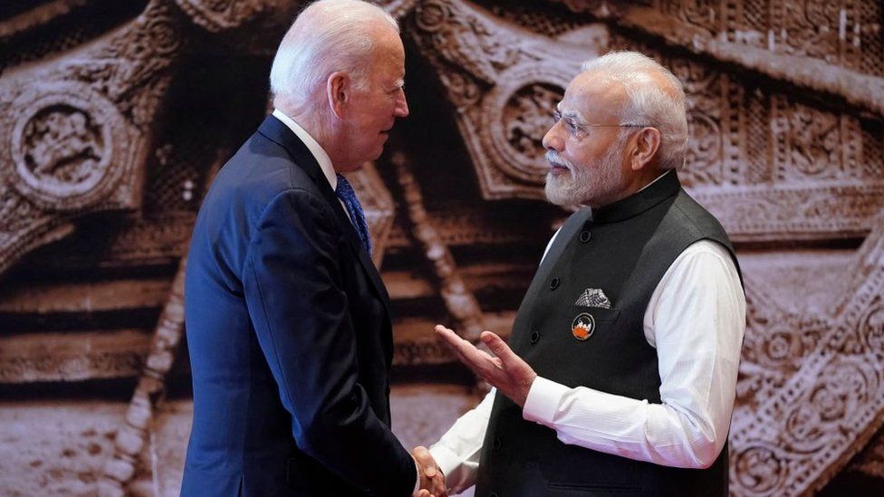 India's Prime Minister Narendra Modi (R) shakes hand with US President Joe Biden ahead of the G20 Leaders' Summit in New Delhi on September 9, 2023. (Photo by Evan Vucci / POOL / AFP) (Photo by EVAN VUCCI/POOL/AFP via Getty Images)