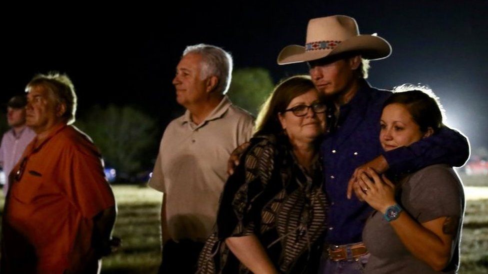 Johnnie Langendorff (2nd right) during a vigil in Sutherland Springs