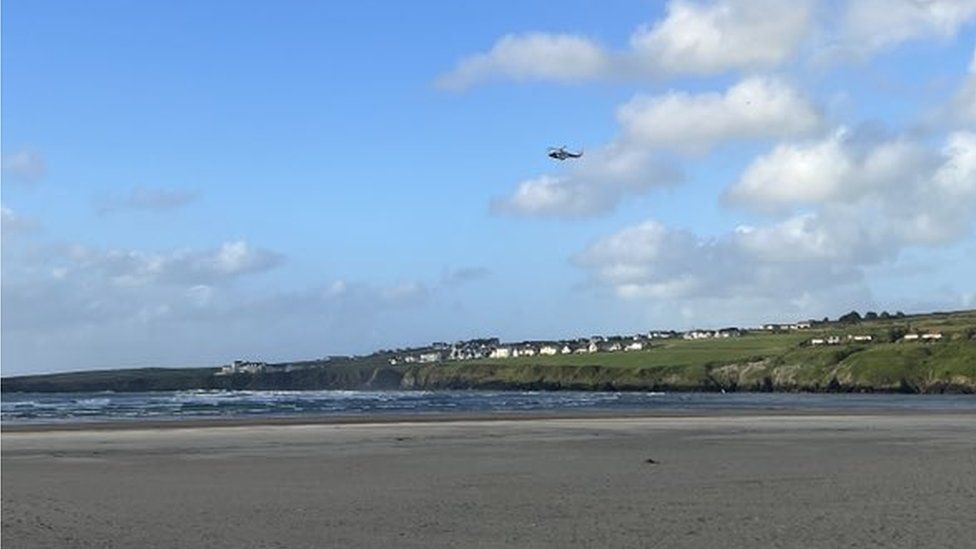 Helicopter seen over the beach during Friday's incident