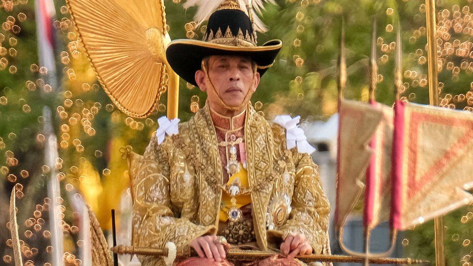 Thailand's newly crowned King Maha Vajiralongkorn is carried in a golden palanquin during the coronation procession on May 5, 2019 in Bangkok