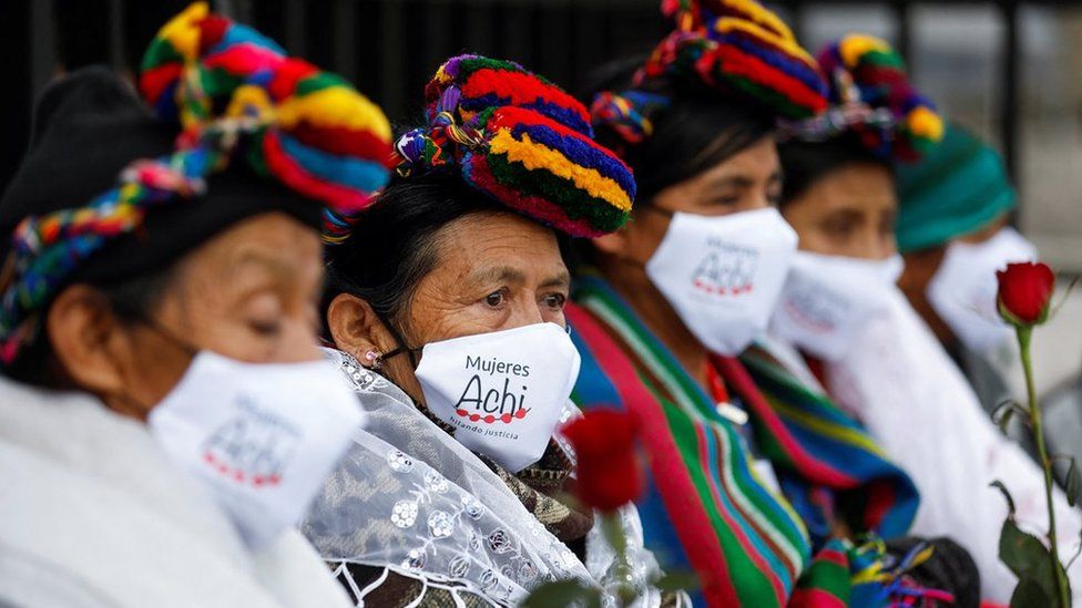 Women gather during the trial of five former Guatemalan paramilitaries charged with the rape of 36 women from the indigenous Achi group from 1981 to 1985