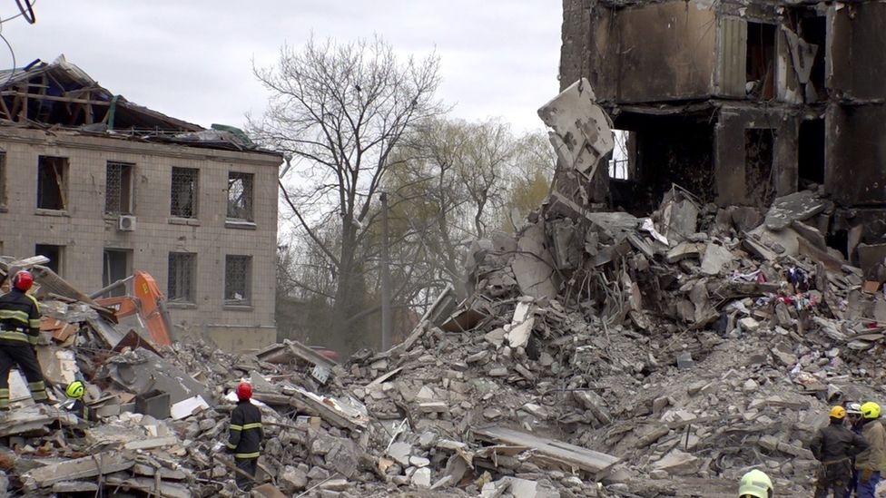 Rescue teams clear debris near destroyed houses in Borodyanka, Ukraine