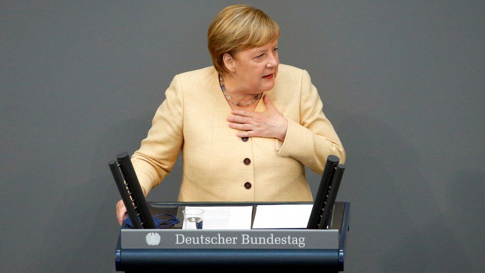 German Chancellor Angela Merkel speaks at the plenary hall of the lower house of Parliament, or Bundestag on 7 Sept 2021