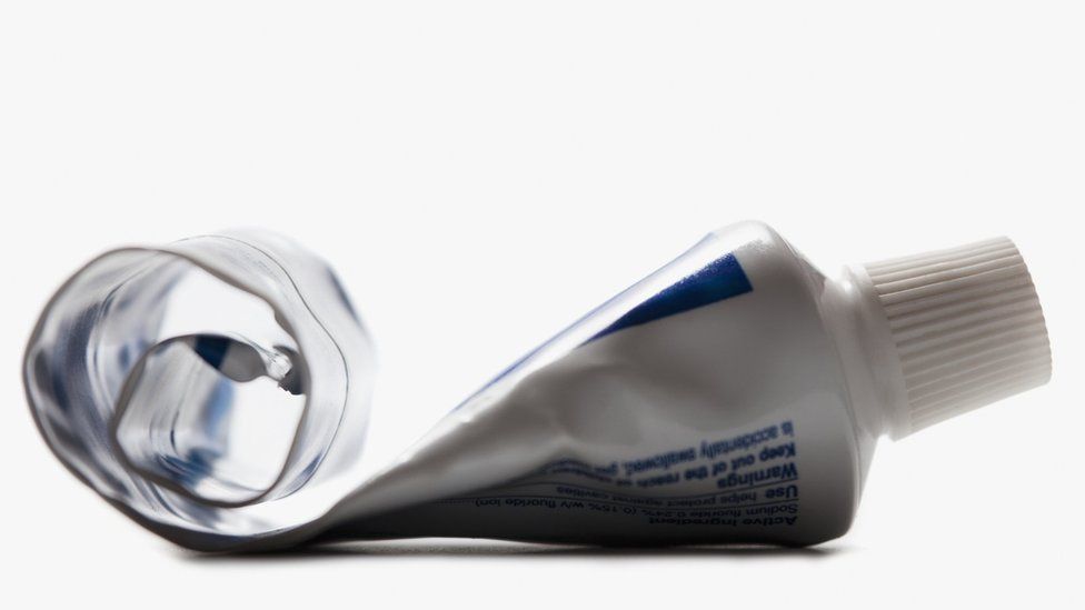 File photo of a half-empty toothpaste tube