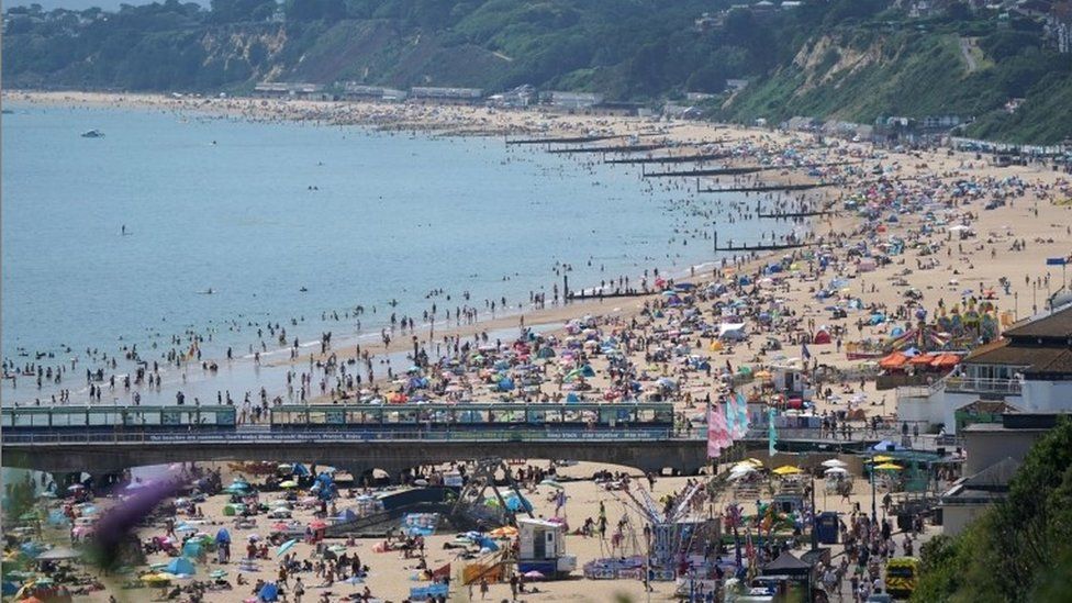 Mass rescue of 17 caught in rip current off Bournemouth BBC News