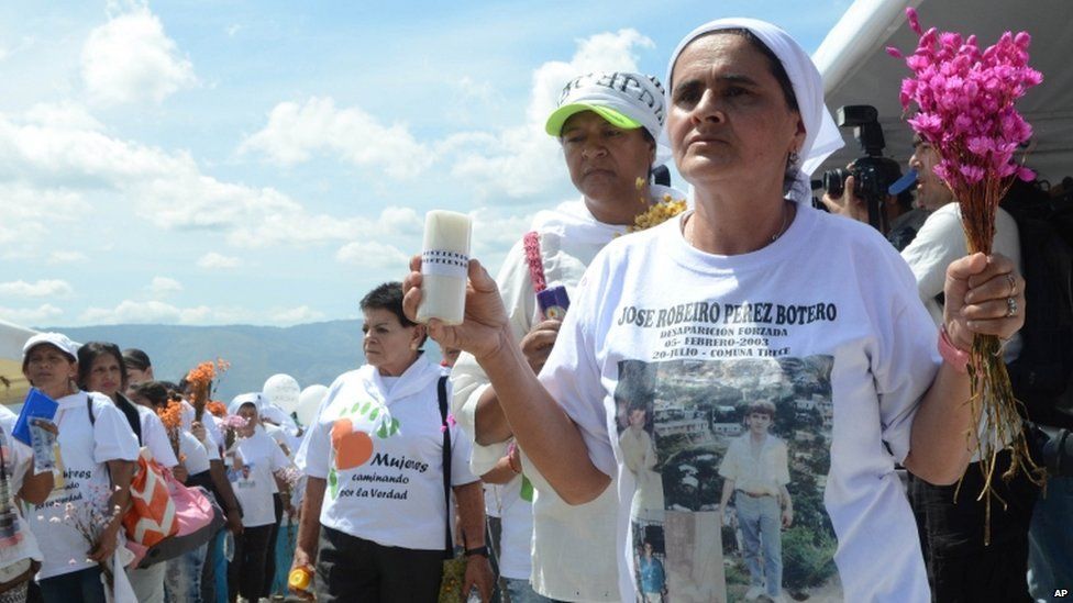 Victims' relatives at Medellin landfill site