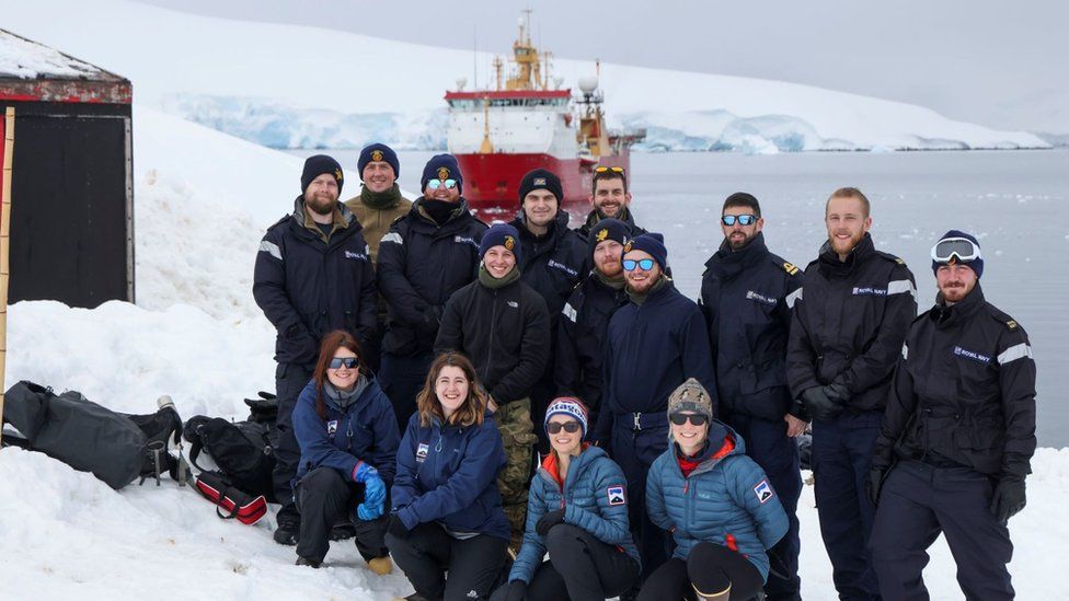 Group shot of sailors and staff at Port Lockroy