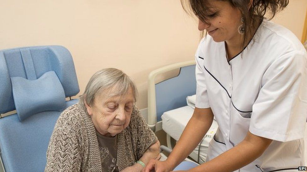 Picture of nurse caring for patient after stroke