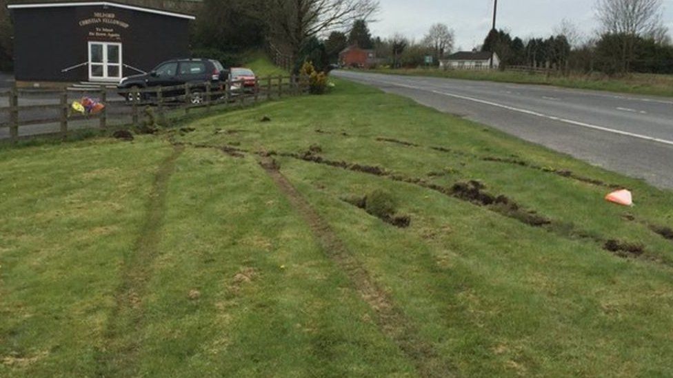 Site of accident where Lesley-Ann McCarragher was struck by a vehicle, Monaghan Road in Armagh, grass with tyre marks apparent