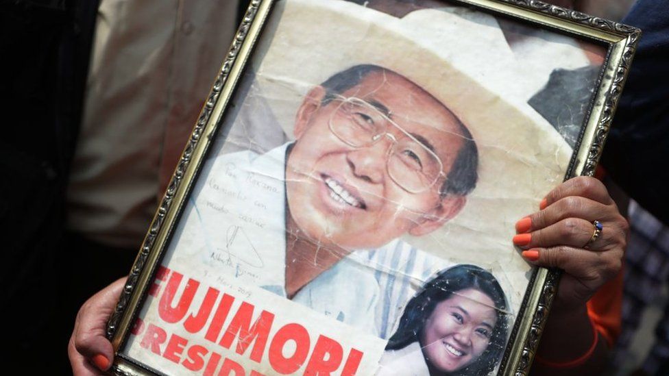 Supporters of former president Alberto Fujimori await outside of Penal Barbadillo for his release on December 06, 2023 in Lima, Peru.