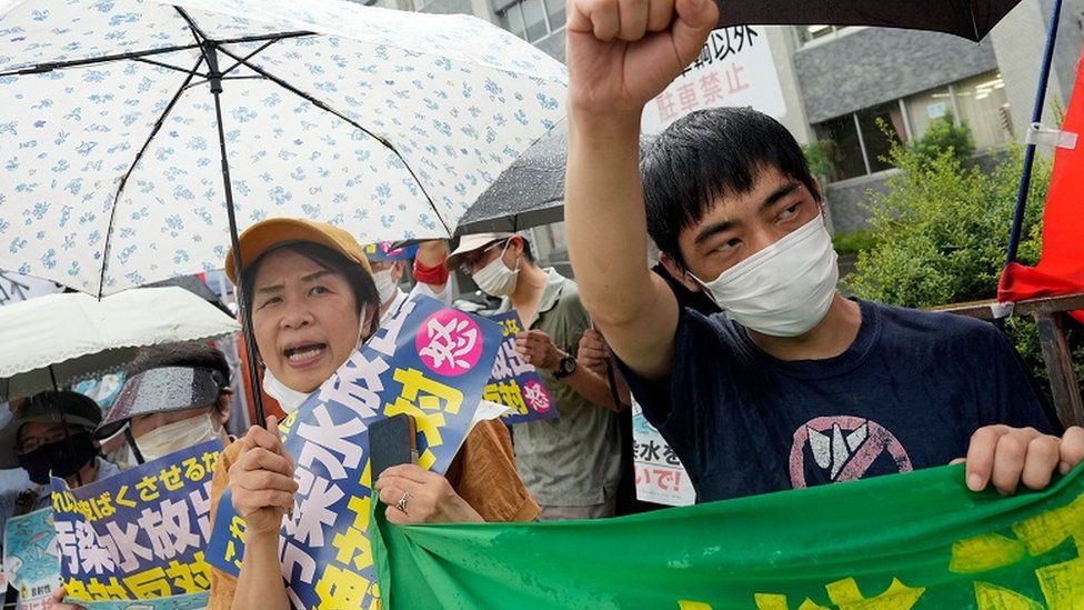 Protesters call for the water release plan to be called off in a rally outside the Japanese PM's residence in Tokyo