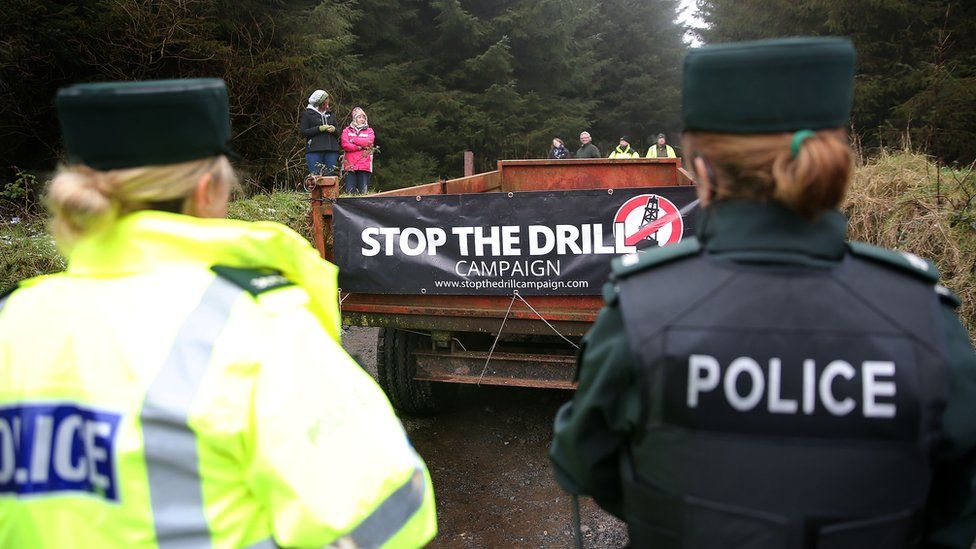 Police watch protesters at Woodburn forest