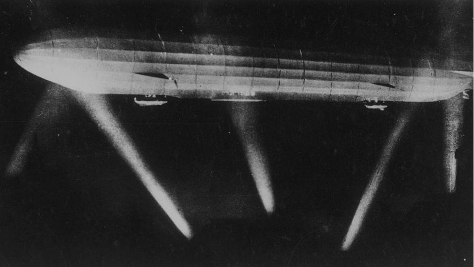 An airship in the searchlights