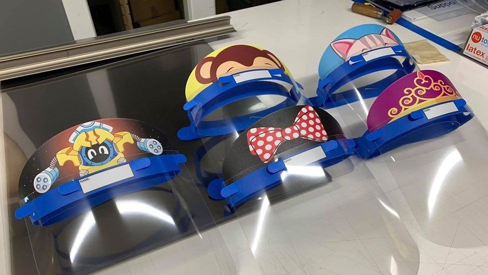 Protective face visors decorated with cartoons