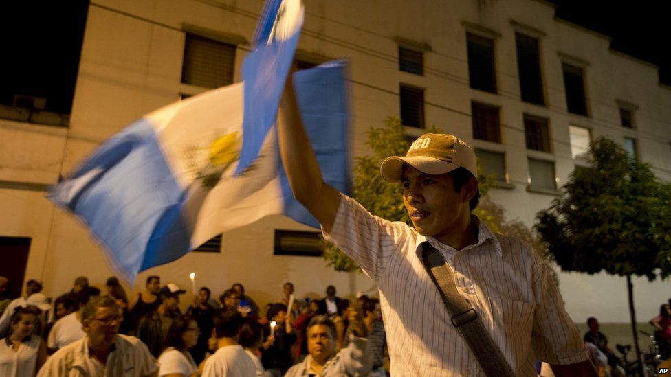 A protestor demands President Perez Molina resign