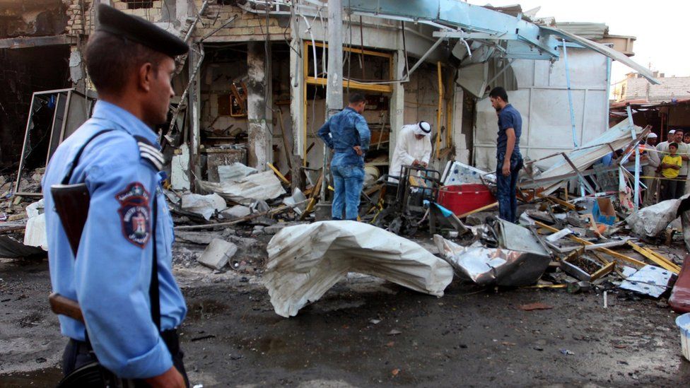 Aftermath of car bomb blast in al-Zubair, Iraq, on 5 October 2015