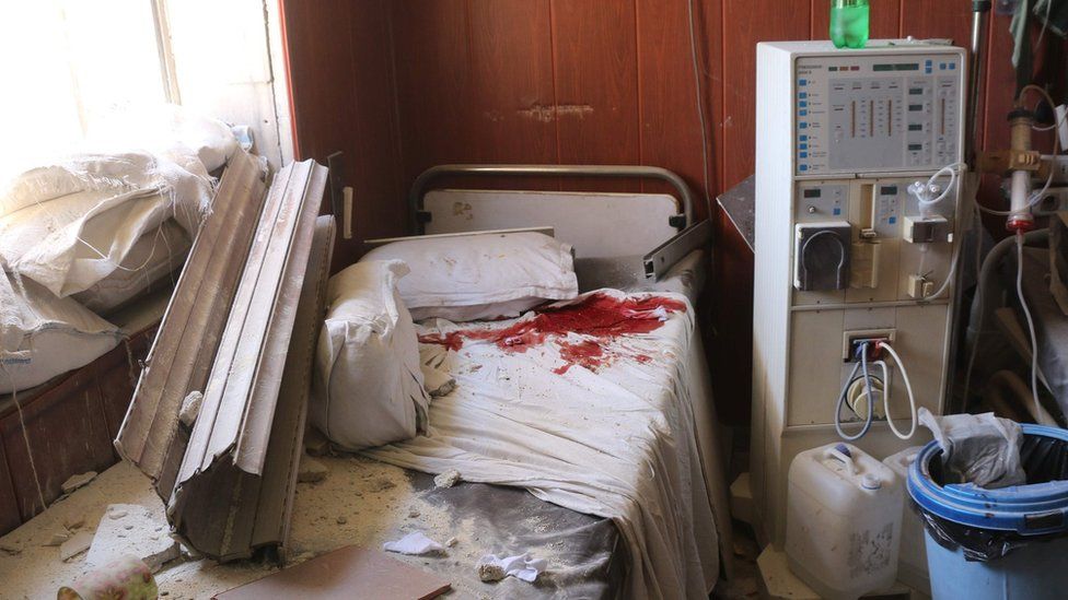 Blood-stained bed inside a hospital the rebel-held Maadi district of Aleppo reportedly hit in an air strike (16 July 2016)