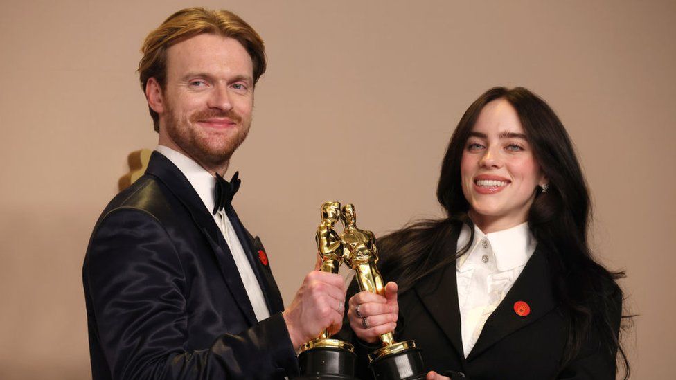 Finneas O'Connell and Billie Eilish, winners of the Best Original Song award for 'What Was I Made For?' from "Barbie", pose in the press room during the 96th Annual Academy Awards at Ovation Hollywood on March 10, 2024 in Hollywood, California.