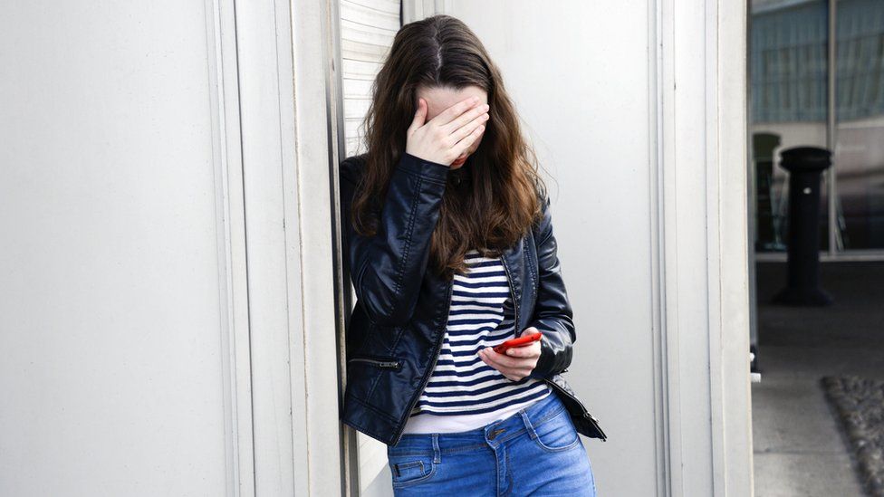 Girl holding phone