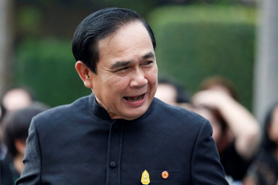 Thailand"s Prime Minister Prayuth Chan-ocha smiles as he arrives at a weekly cabinet meeting at the Government House in Bangkok, Thailand, April 4, 2017