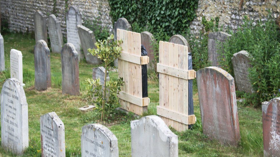 Covered gravestones