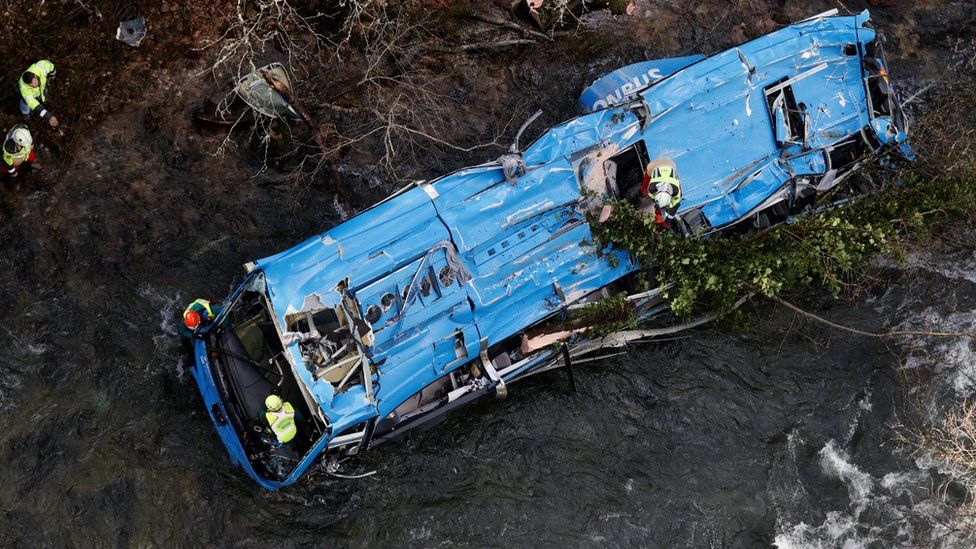 Spain's Civil Guard work at the bus crash site in the Lerez river, north-western Spain. Photo: 26 December 2022
