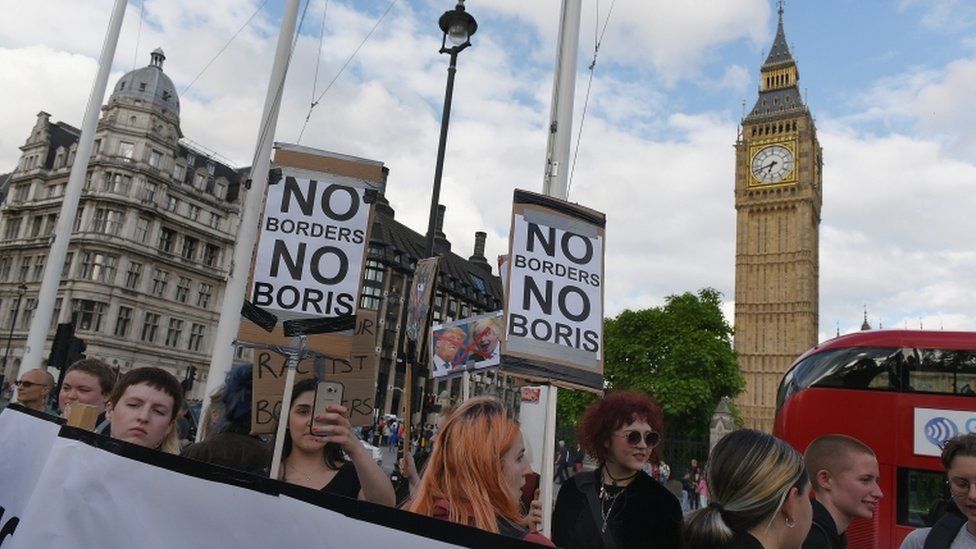 Protesters outside the Houses of Parliament